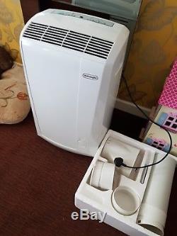 Portable air conditioning unit with dehumidifier
