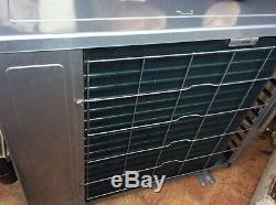 Wall mounted air conditioning unit